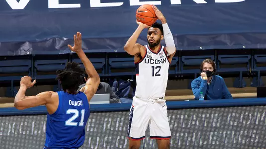 Tyler Polley shoots a three-pointer against Seton Hall on February 6, 2021.