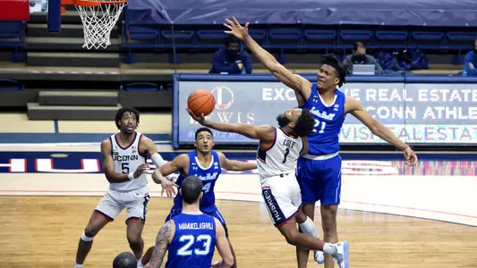 R.J. Cole drives the lane and gets fouled against Seton Hall on February 6, 2021.