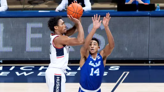 Brendan Adams shoots a three-pointer against Seton Hall on February 6, 2021.