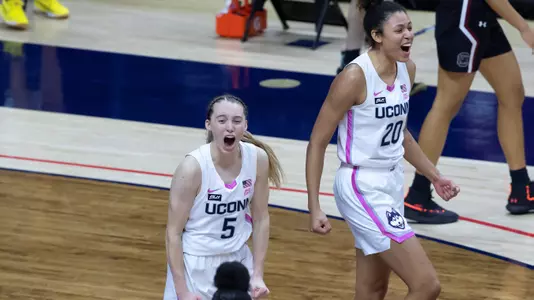 Paige Bueckers and Olivia Nelson-Ododa celebrate following the win against South Carolina on February 8, 2021.
