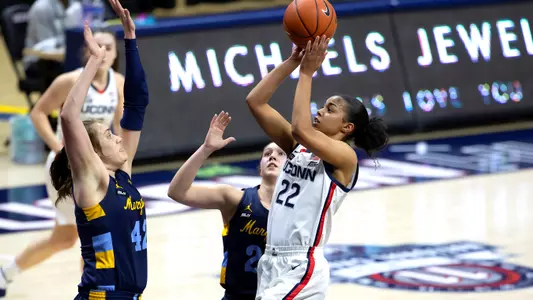 Evina Westbrook takes a shot against Marquette on March 1, 2021.