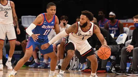 R.J. Cole dribbles during UConn's BIG EAST Quarterfinal matchup against DePaul.