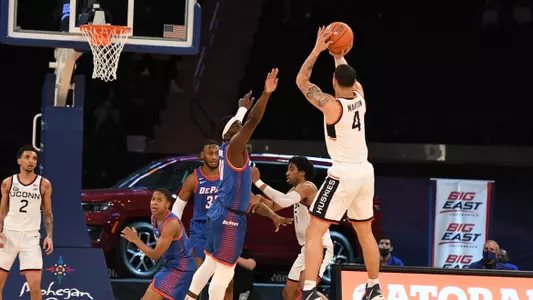 Tyrese Martin shoots a three-pointer during UConn's BIG EAST Quarterfinal matchup against DePaul.