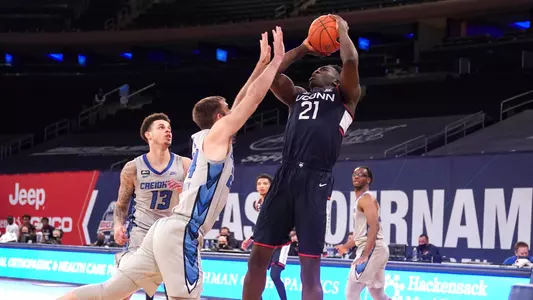 Adama Sanogo takes a shot during the semifinal round of the BIG EAST Tournament.
