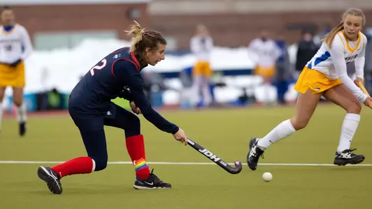 Jessica Debrowski strikes a pass against Hofstra on February 13, 2021.