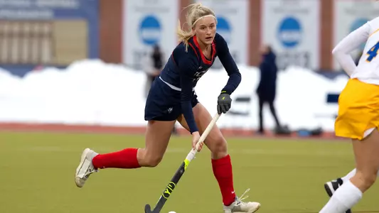 Sophie Hamilton sizes up the defense Sophie Hamilton controls the ball against Hofstra on February 13, 2021.