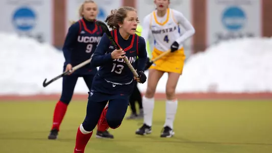 Morgan Kaufman looks for a teammate Sophie Hamilton controls the ball against Hofstra on February 13, 2021.