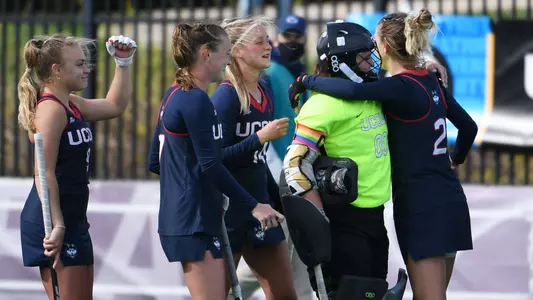 The Huskies celebrate after their 5-0 NCAA Tournament win over Rider