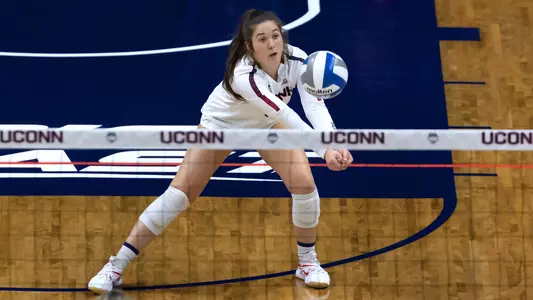 Mia Ruffolo digging the ball