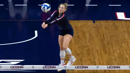 Karly Berkland digging the ball