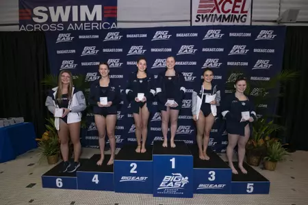 Divers on Podium at Big East Champs