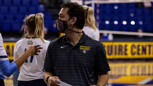 Peter Netisingha coaching at Marquette