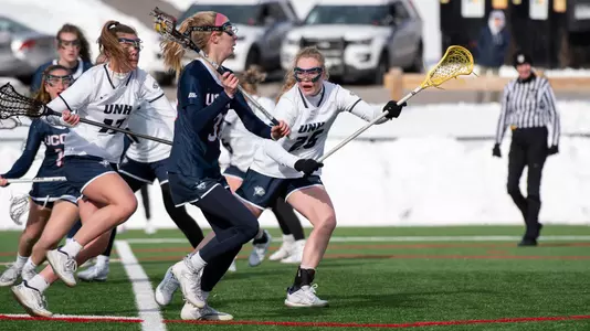 Abby Charron passing the ball