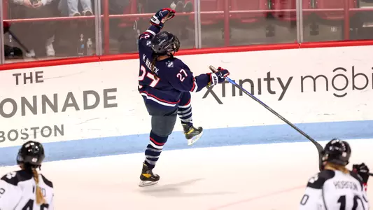 Morgan Wabick celebrates after scoring a goal against Northeastern in the Hockey East Championship.