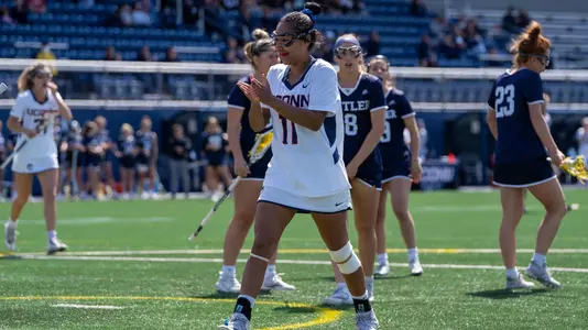 Sydney Watson celebrating after scoring a goal against Butler