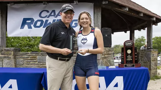 Catherine Esparza receiving All-CAA trophy