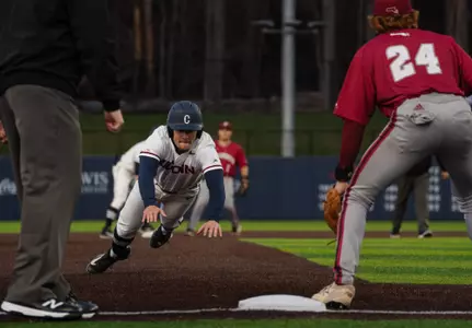 UMass game sliding headfirst