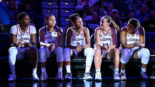 UNCASVILLE, Conn - October 13 - guard Azzi Fudd #35, guard Kk Arnold #2, forward Sarah Strong #21, guard Ashlynn Shade #12, forward Serah Williams #22 of the UConn Huskies against the Boston College Eagles at Mohegan Sun Arena in Uncasville, CT.
Photo by Simon Asher