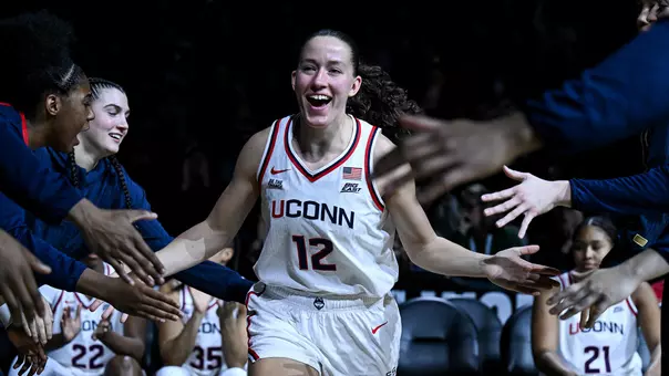 NEW YORK, NEW YORK- December 20 - Ashlynn Shade #12 of the UConn Huskies against the Iowa Hawkeyes at Barclays Center in New York City, NY.
Photo by Simon Asher