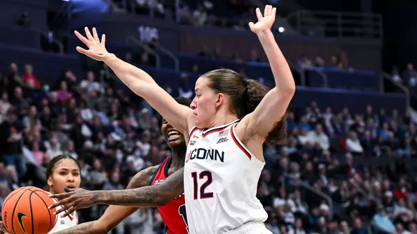 HARTFORD, CONNECTICUT - January 7 - Ashlynn Shade #12 of the UConn Huskies against the St. Johns Red Storm at PeoplesBank Arena in Hartford, CT.
Photo by Simon Asher