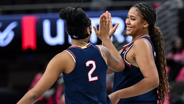 OMAHA, NEBRASKA - January 11 - Kk Arnold #2 of the UConn Huskies, Sarah Strong #21 of the UConn Huskies in the game against the Creighton Bluejays at the CHI Health Center on January 11 in Omaha, Nebraska.
Photo by Simon Asher