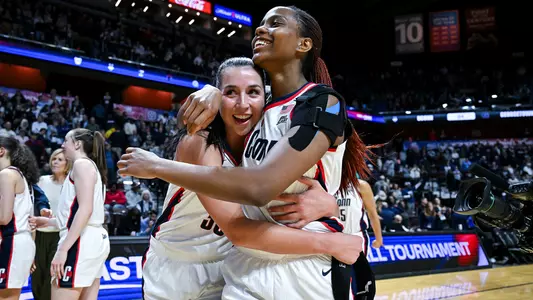 UNCASVILLE, CONNECTICUT - March 6 - Caroline Ducharme #33 of the UConn Huskies, Blanca Quinonez #4 of the UConn Huskies against the Georgetown Hoyas during the Big East Women’s Basketball quarterfinals at Mohegan Sun Arena in Uncasville, Connecticut.
Photo by Simon Asher