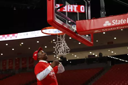 the University of Houston men's basketball cuts down the nets after claiming the 2020 regular season conference championship at the Fertitta Center on Sunday March 8, 2020 in Houston, Texas.Photo by Aaron M. Sprecher