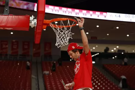 the University of Houston men's basketball cuts down the nets after claiming the 2020 regular season conference championship at the Fertitta Center on Sunday March 8, 2020 in Houston, Texas.Photo by Aaron M. Sprecher