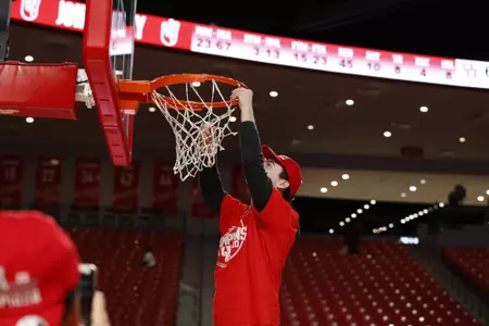 the University of Houston men's basketball cuts down the nets after claiming the 2020 regular season conference championship at the Fertitta Center on Sunday March 8, 2020 in Houston, Texas.Photo by Aaron M. Sprecher
