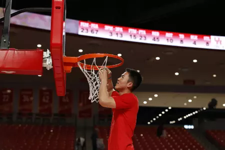 the University of Houston men's basketball cuts down the nets after claiming the 2020 regular season conference championship at the Fertitta Center on Sunday March 8, 2020 in Houston, Texas.Photo by Aaron M. Sprecher