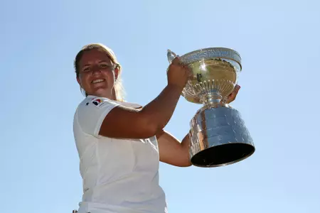 SOUTHPORT, ENGLAND - JUNE 30: Leonie Harm of Germany with the trophy after winning the final on day five of The Ladies' British Open Amateur Championship at Hillside Golf Club on June 30, 2018 in Southport, England. (Photo by Julian Herbert/R&A/R&A via Getty Images)