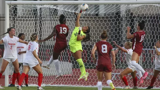 Mikaela Garcia with a save against the Sooners.