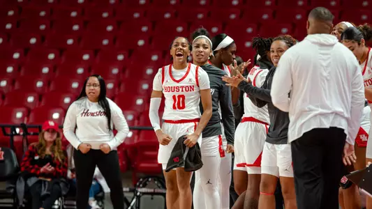 Britney Onyeje Bench Celebrates vs Texas A&M Commerce