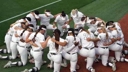 Team huddle at Texas