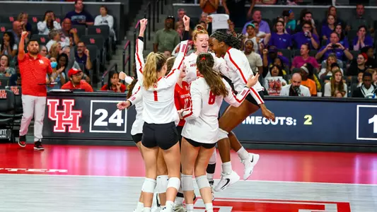 Team celebrates vs High Point