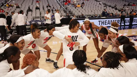 Team huddle at AAC Championships