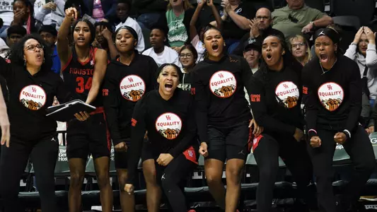 Bench celebrates as Cougars upset #24 South Florida