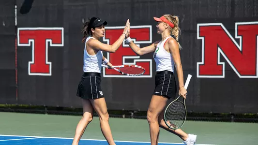 Azul Pedemonti and Sonya Kovalenko high-five