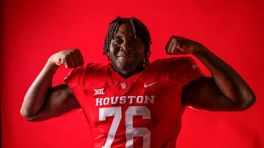 Patrick Paul red backdrop