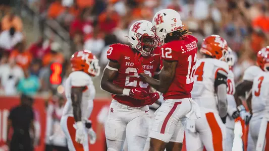 Parker Jenkins celebrates with Stephon Johnson