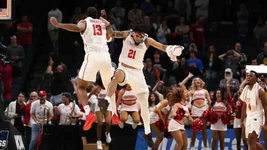 J'Wan Roberts and Emanuel Sharp celebrate during NCAA Round of 32