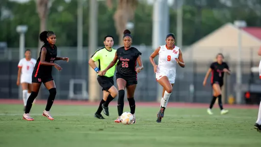 Cam Maddox goes for goal