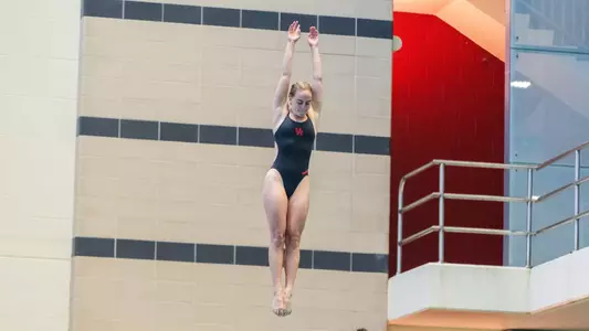 Junior Michelle McLeod Diving from the 3-meter springboard