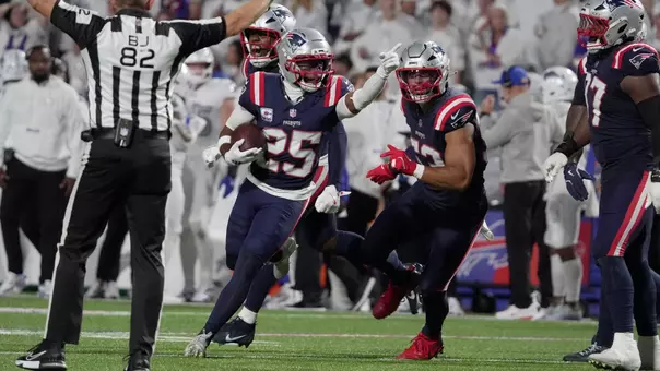 New England Patriots cornerback Marcus Jones celebrates his interception during second half action at Highmark Stadium in Orchard Park on Oct. 5, 2025.