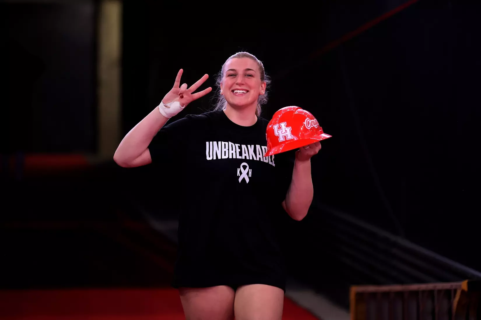 Ella Wendel walks down the tunnel to the court pregame.