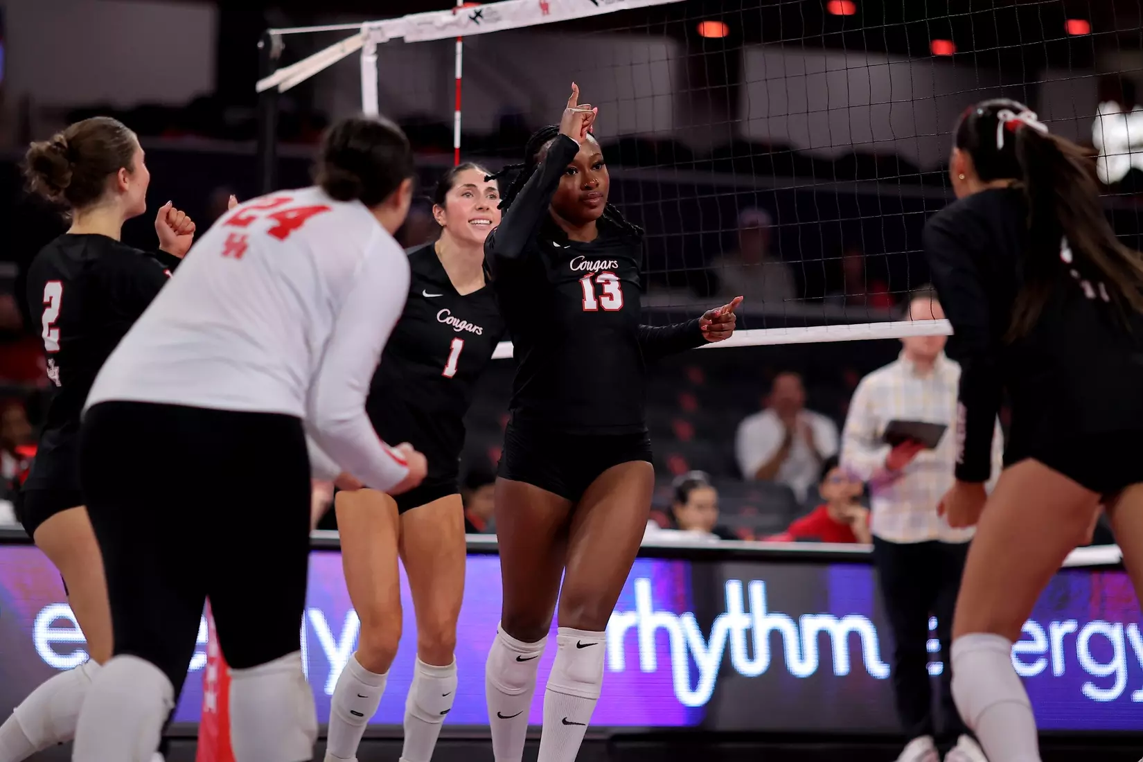 Barakat Rahmon and Houston Volleyball celebrates after winning a point.