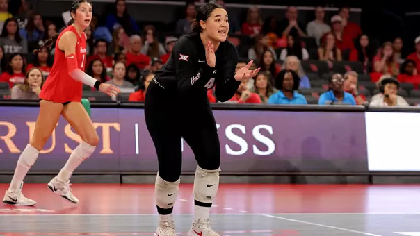 Gillian Pitts celebrates after a point.