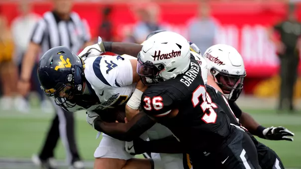 Jalen Garner makes a tackle vs. West Virginia