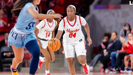 Shun'teria Anumele dribbling ball against Rice