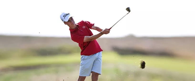 DEAL, ENGLAND - JUNE 17: Miles Wennestam of Switzerland plays a shot during Qualifying for the The Amateur Championship at Royal Cinque Ports Golf Club on June 17, 2025 in Deal, England. (Photo by Alex Burstow/R&A/R&A via Getty Images)